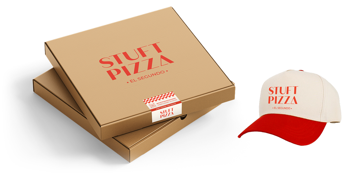 pizza boxes and ballcap